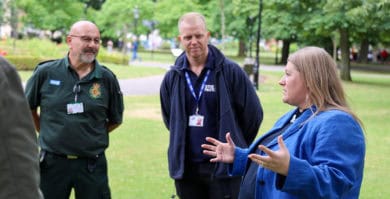 Donna Jones talking to ambulance staff and street pastors