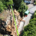 Aerial view of work taking place on Gills Cliff Road