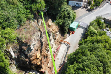 Aerial view of work taking place on Gills Cliff Road