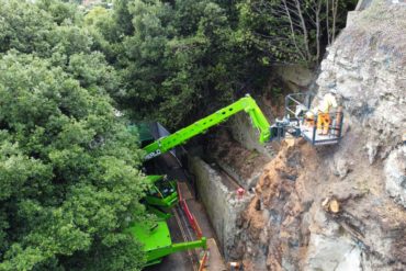 Operative on a cherry picker during Lower Gills Cliff Road works