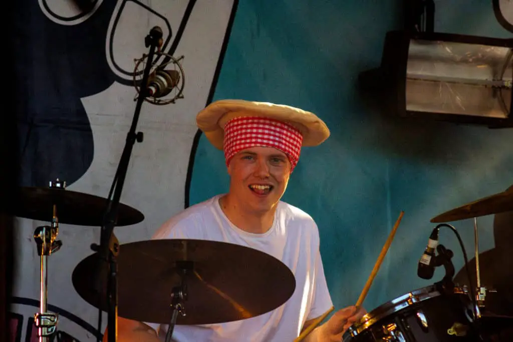 Rufus Reader playing drums at IW festival
