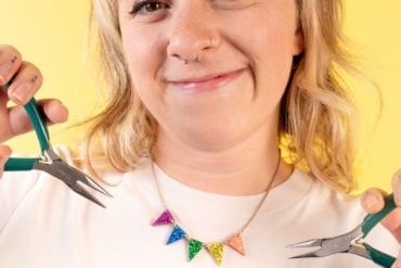 Woman wearing mini bunting necklace at Tatty Devine Fringe Workshop