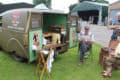 Vehicle on display and people in 40s gear