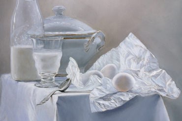 Painting of breakfast items on a table, milk, eggs and plates