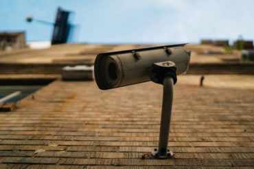 cctv camera on side of brick building