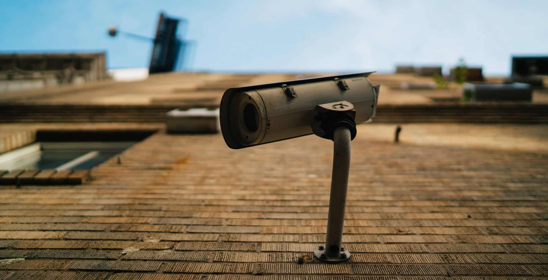 cctv camera on side of brick building