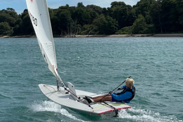 nestor sailing a laser dinghy