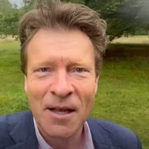 richard tice talking outdoors with greenery in the background