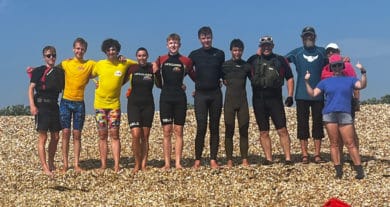 Beach lifeguards after the swim from Gosport to Ryde