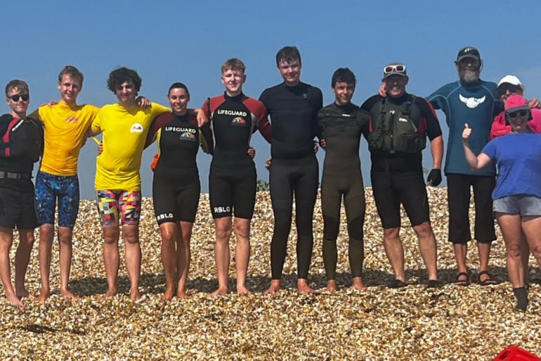 Beach lifeguards after the swim from Gosport to Ryde