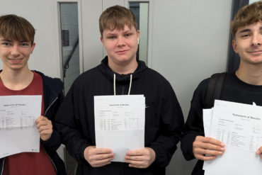 Students at Island VI Form with their results