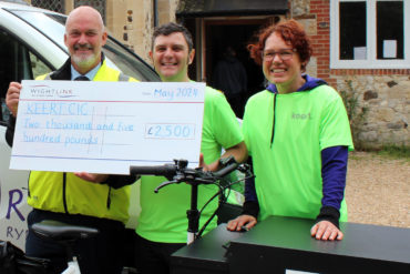 Keert staff with cheque from Wightlink