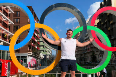 Nick percy with olympic rings in paris