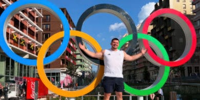 Nick percy with olympic rings in paris