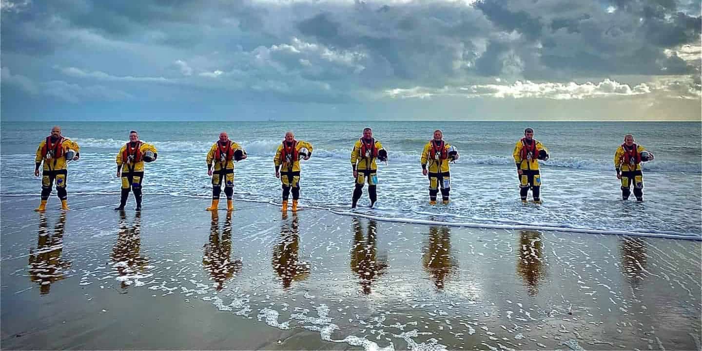 Sandown and Shanklin Independent Lifeboat Crew lined up on the beach for Volunteers Week