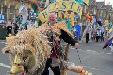 Queen's Beasts Pageant lion costume in Sandown carnival parade