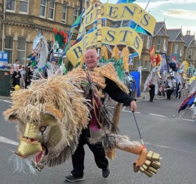 Queen's Beasts Pageant lion costume in Sandown carnival parade