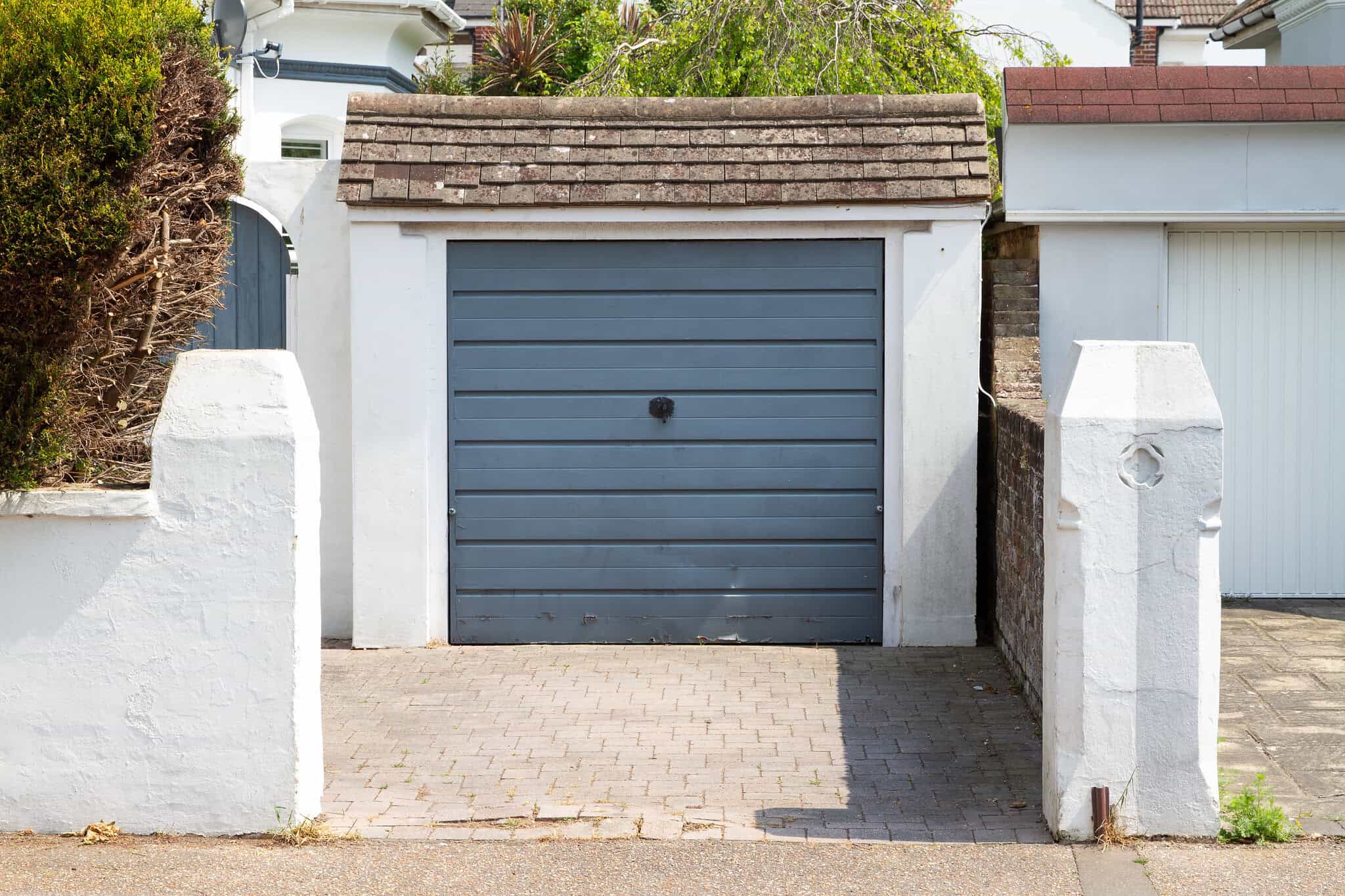 House with a brick driveway