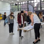 island vi form students collecting their results