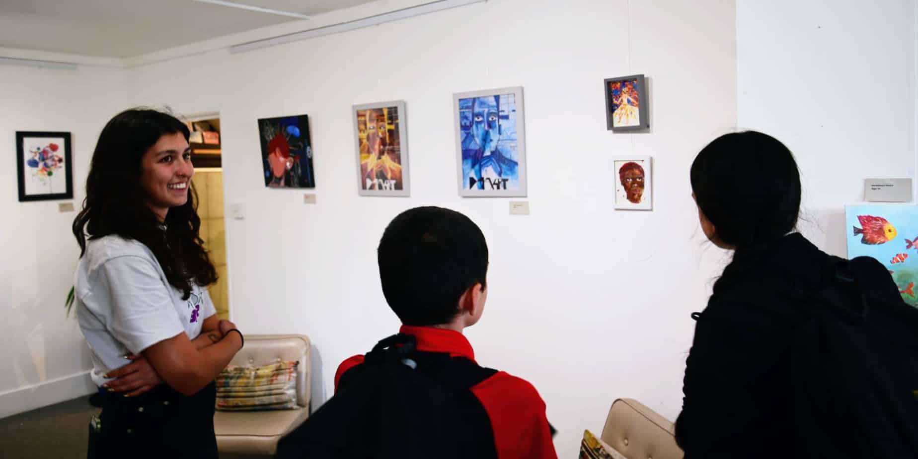 people looking at the Young Artist Award Exhibition