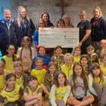 4th Sandown Brownies presenting a cheque to Mountbatten