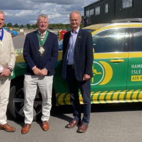 Councillor Karl Love with his partner and consort David Hill, alongside Richard Corbett, air ambulance chief executive officer, and air ambulance chairman, David Drew.