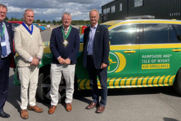 Councillor Karl Love with his partner and consort David Hill, alongside Richard Corbett, air ambulance chief executive officer, and air ambulance chairman, David Drew.