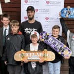 John Cattle's Skate Club members with their skateboards