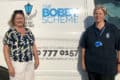 Lisa and Lois standing by Blue Lamp Trust van