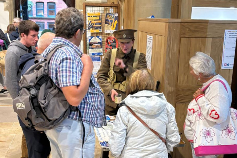 People at the Minster looking at heritage displays