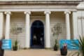 Outside Northwood house with IW literary festival banners-lg