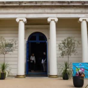 Outside Northwood house with IW literary festival banners-lg