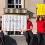 School protest outside County Hall - children holding banners