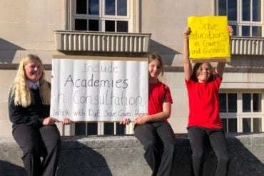 School protest outside County Hall - children holding banners