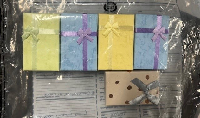 Pastel coloured gift boxes with bows on