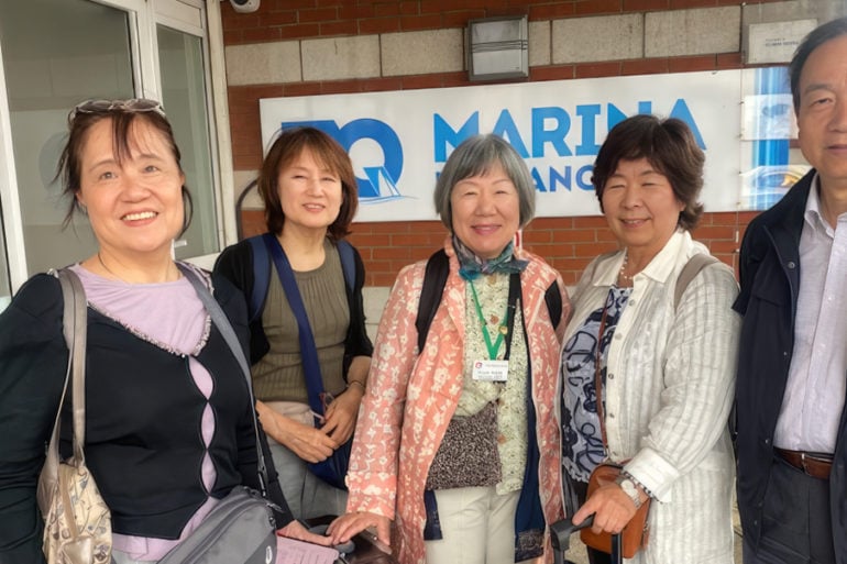 friendship force japanese visitors at the airport