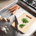 kitchen scene showing vegetables and hob