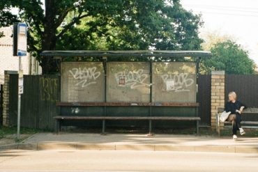 woman at a bus stop