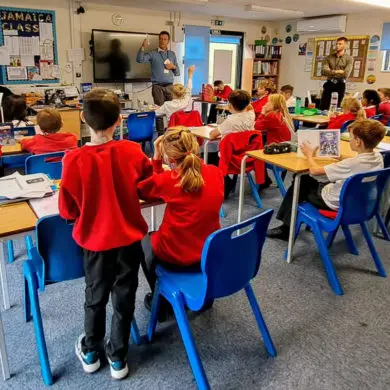 Joe Robertson MP talking to a class of pupils at Brading Primary