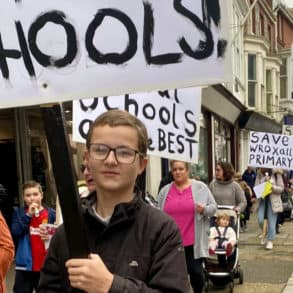 School closure protest in Newport - October 2024 - showing protestors marching to County Hall