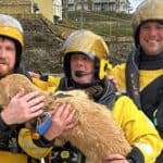 Freshwater lifeboat crew with the Ted the dog after the rescue