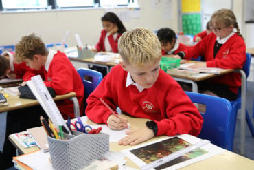 f Year 6 children working in Brading C of E Primary School