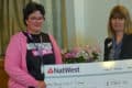 Isle of Wight Crematorium cheque presentation featuring Janice and Susan