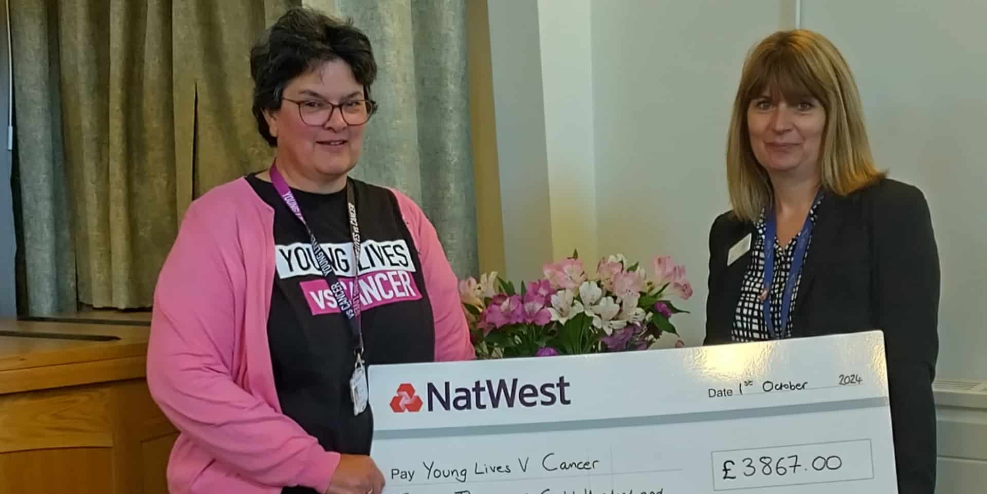 Isle of Wight Crematorium cheque presentation featuring Janice and Susan