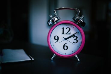 Pink clock with large numerals