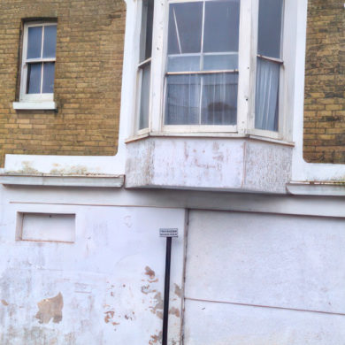 Exterior of the Sandown eyesore - a building with boarded up windows