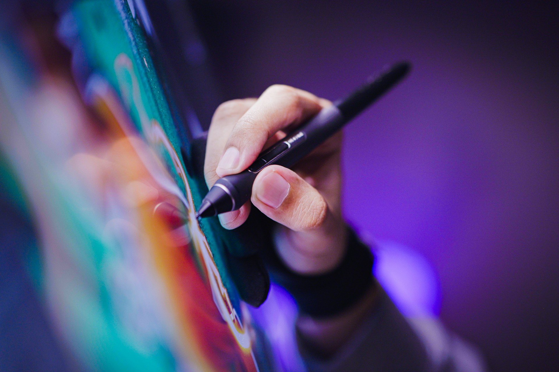 artist drawing on an ipad