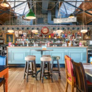 Inside a bright and colourful loungers bar