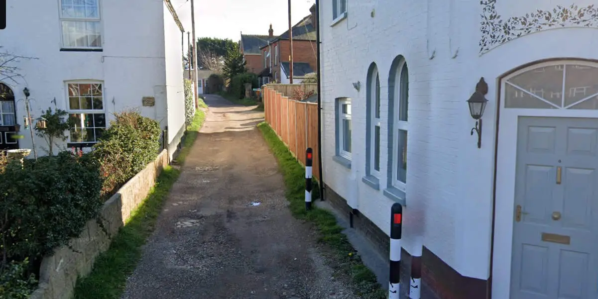 Google maps photo of entrance to 'new village' private road