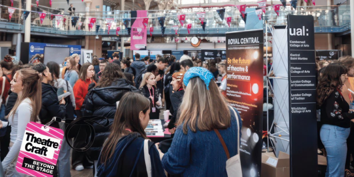 Young people milling around the theatrecraft marketplace event